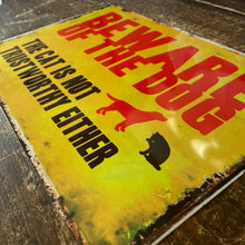 Beware of the dog sign, vibrant yellow 'warning' sign with red and black text.