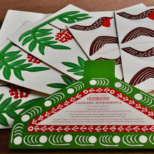 Close up of the contents of the Robin and Rowan paper garland from Cambridge Imprint