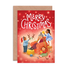 Christmas card with illustrations of children decorating Grandma with decorations, with 'Merry Christmas' text.