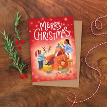 Christmas card with children decorating Grandma with decorations on a wooden surface with decorative elements.