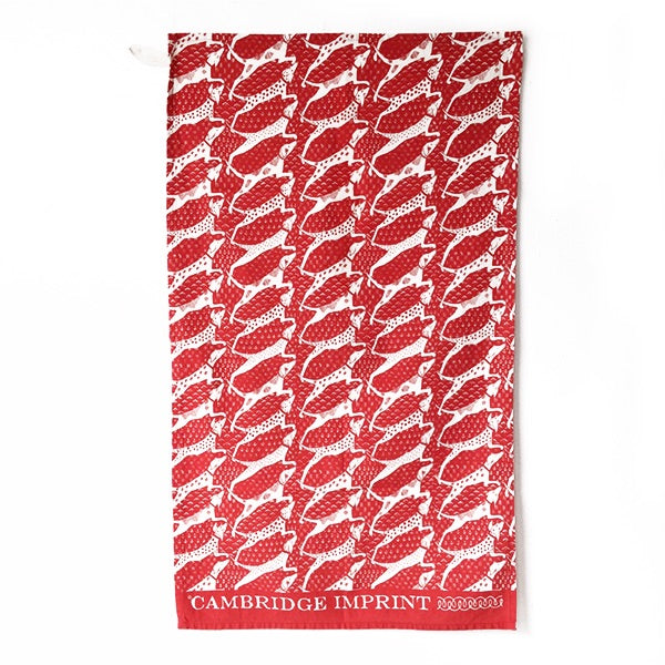 Tea towel with repeat dog print in red and cream by Cambridge Imprint