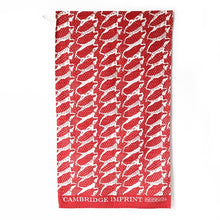 Tea towel with repeat dog print in red and cream by Cambridge Imprint