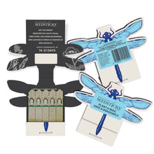 Seedsticks dragonfly seed starter kit showing an open pack, and a closed front and back packet all arranged on a white background.