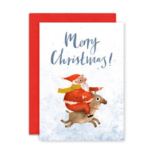 Christmas card with Santa riding a reindeer and 'Merry Christmas!' text on a snowy background.