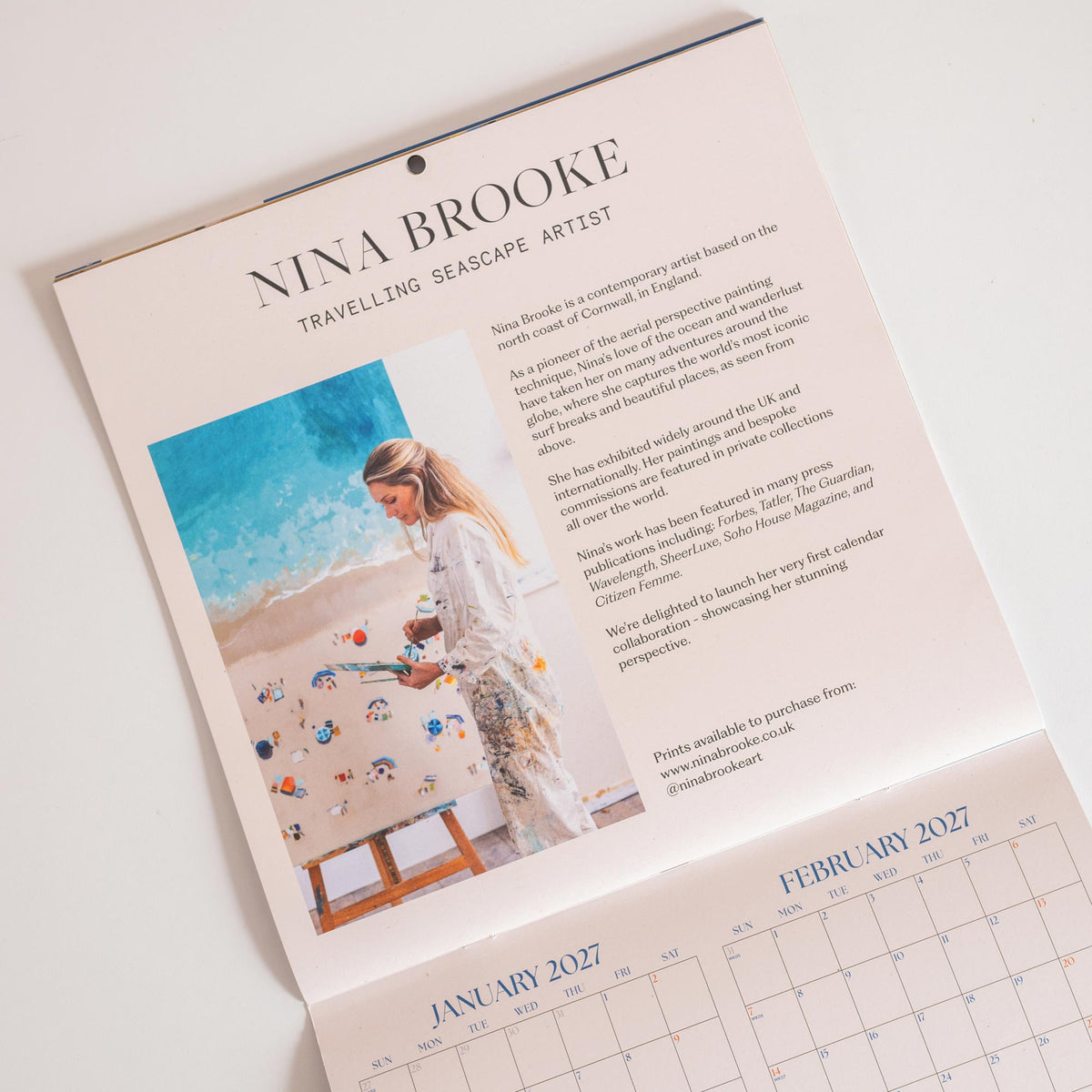 Calendar with Nina Brooke's artwork and biography on a light background