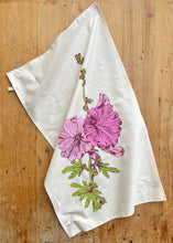 Bright pink Hollyhock flowers on their tall green stem feature on this screen printed tea towel.