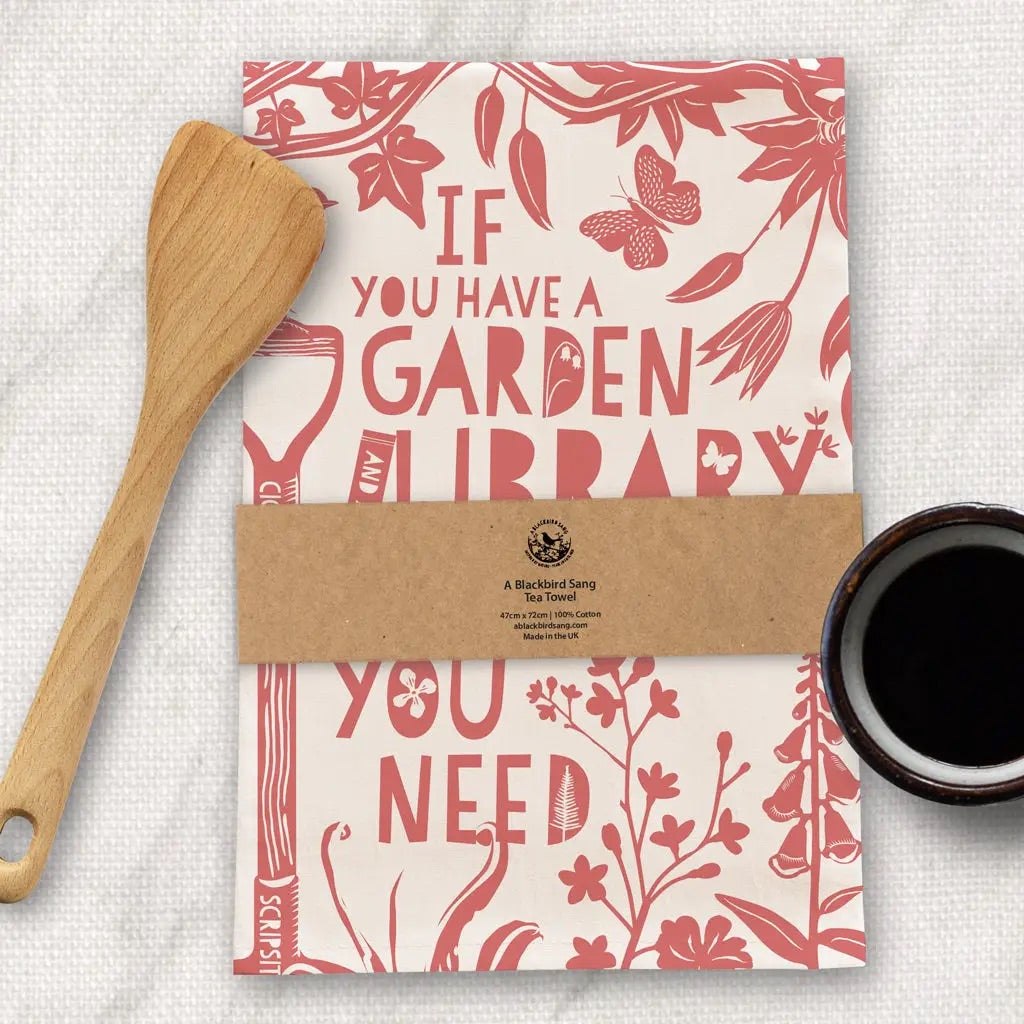 Garden themed tea towel with paper sleeve.