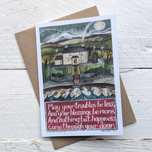 A thoughtful greeting card with a hand-drawn countryside scene and a red text box at the bottom, which contains an old Irish blessing: 'May your troubles be less, and your blessings be more, and nothing but happiness come through your door'.