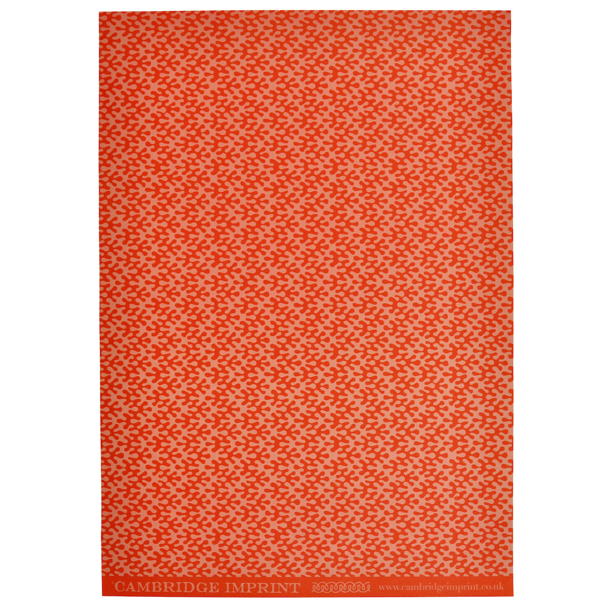 Patterned red and pink wrapping paper in kelp design