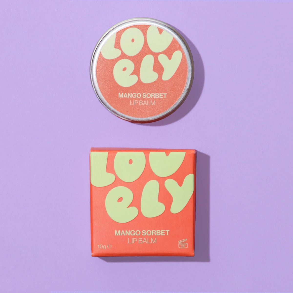 Lovely Skincare's Mango Sorbet lip balm with packaging on a purple background