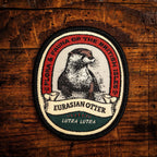 Patch of an Eurasian Otter on a wooden background