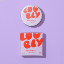 Lovely Peach Melba lip balm and packaging on a purple background