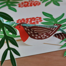 Close up of robin and rowan garland being made by Cambridge Imprint
