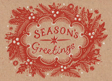 A vintage-style holiday greeting card design with the words “Season’s Greetings” in red lettering, surrounded by a red wreath of pine branches, berries, and snowflake motifs on a warm tan background.