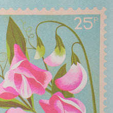 Close up of risograph print of pink sweet pea flowers with green stems against a blue background in the style of a vintage postage stamp. 