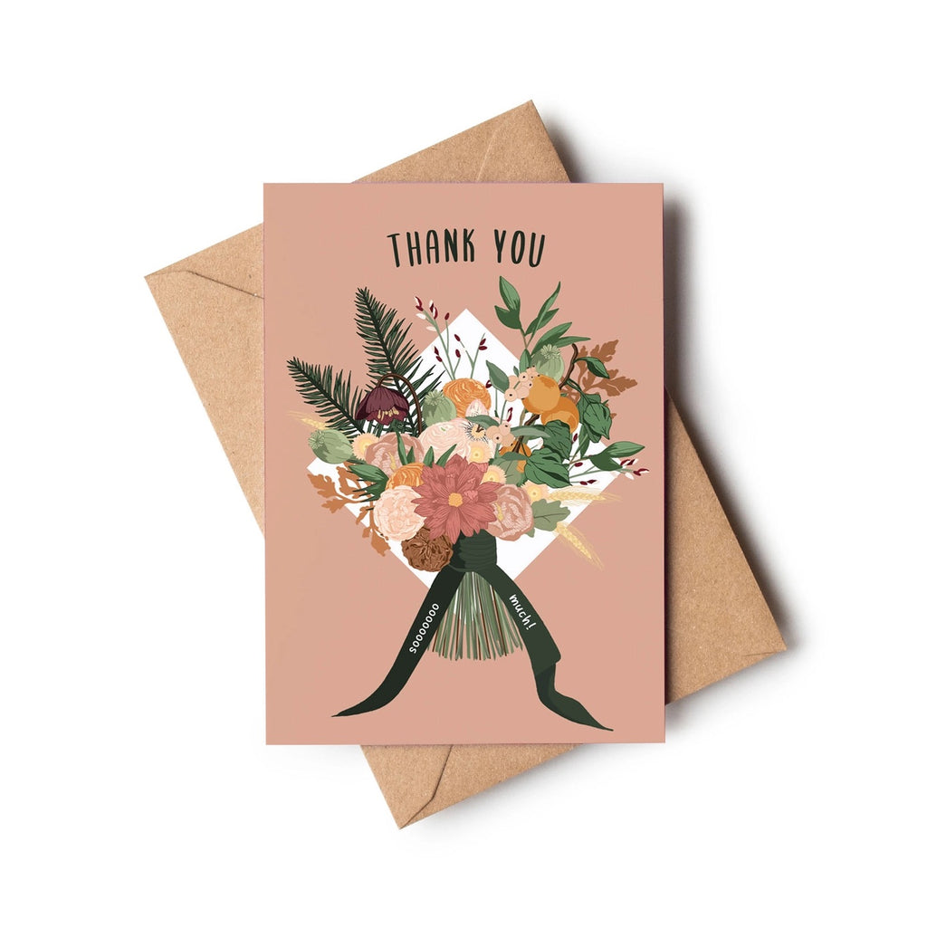 A thank you card with a dusty pink background and an illustrated bouquet of flowers tied with a dark green ribbon, shown with a brown kraft envelope on a white background.