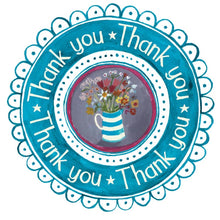Thank you card with the wording 'Thank You' arranged circular in a wreath surrounding a nice jug of flowers.