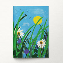 Travel logbook cover with floral design, sun, and birds on a blue background