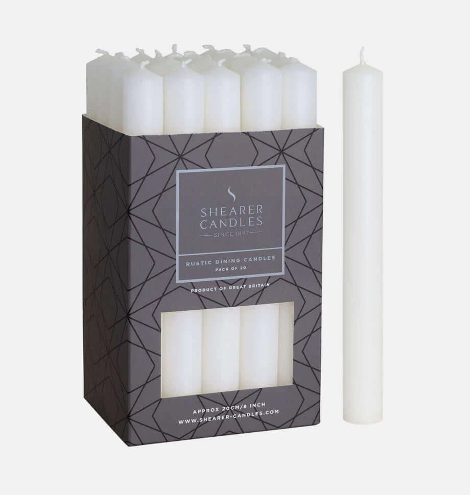 Shearer Candles packaging with white candles on a white background